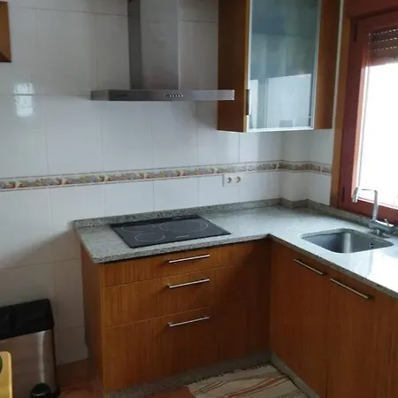 Appartamento ático Céntrico Y Funcional Con Terraza Situado Frente Al Puente De La Toja Y Al Paseo Marítimo De O Grove. Ideal Para Familias O Grupos.