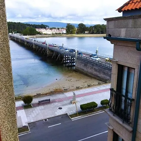 Appartamento ático Céntrico Y Funcional Con Terraza Situado Frente Al Puente De La Toja Y Al Paseo Marítimo De O Grove. Ideal Para Familias O Grupos. *